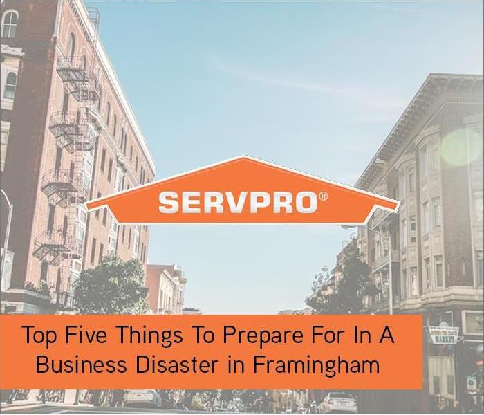 buildings in background with orange box and SERVPRO logo